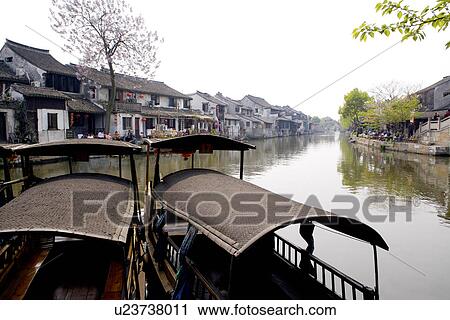 China, Zhejiang Province, Xitang Ancient Scenic Town, row boats View Large Photo Image Stock Image - China, Zhejiang Province, Xitang Ancient Scenic Town, row boats. Fotosearch