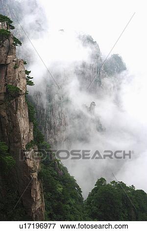 China, Anhui, Mt. Huangshan covered by cloudscape View Large Photo Image Stock Photo - China, Anhui, Mt. Huangshan covered by cloudscape. Fotosearch