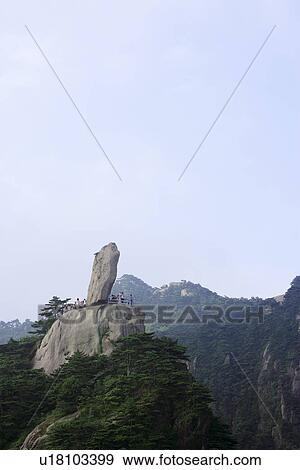 China, Anhui Province, Mt. Huangshan, tourists with Flying Stone View Large Photo Image Stock Photo - China, Anhui Province, Mt. Huangshan, tourists with Flying Stone. Fotosearch