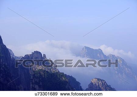 China, Anhui Province, Mt. Huangshan, in morning mist View Large Photo Image Stock Photo - China, Anhui Province, Mt. Huangshan, in morning mist. Fotosearch