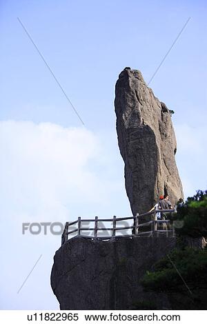 China, Anhui Province, Mt. Huangshan, tourists with Flying Stone View Large Photo Image Stock Photography - China, Anhui Province, Mt. Huangshan, tourists with Flying Stone. Fotosearch