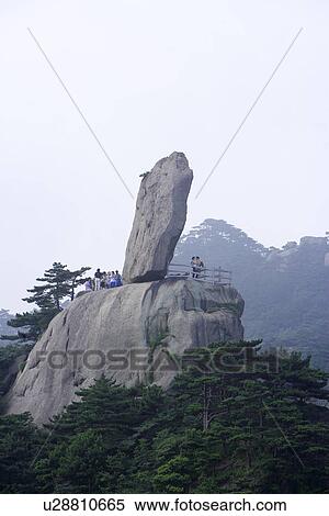 China, Anhui Province, Mt. Huangshan, tourists with Flying Stone View Large Photo Image Stock Photography - China, Anhui Province, Mt. Huangshan, tourists with Flying Stone. Fotosearch