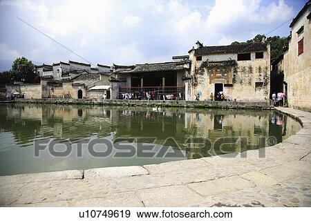 Stock Photo - Half-moon pond, Hongcun village, Anhui Province, China, Asia. Fotosearch