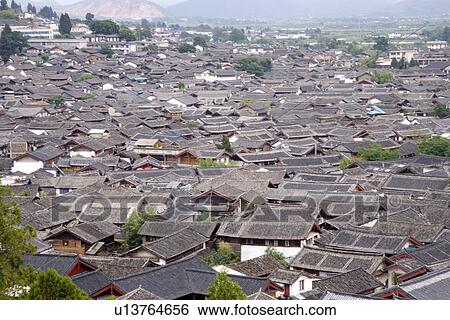 Stock Photograph - CHINA, YUNNAN, LIJANG, ROOFTOPS. Fotosearch