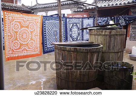 China, Yunnan Province, Baisha old town, Cloth hanging on clothesline View Large Photo Image Stock Image - China, Yunnan Province, Baisha old town, Cloth hanging on clothesline. Fotosearch