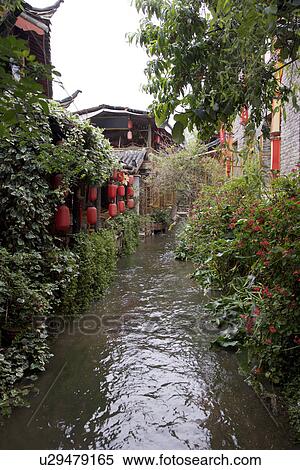 Stock Photography - China, Yunnan Province, Lijiang, Ancient Scenic Town, house along canal. Fotosearch