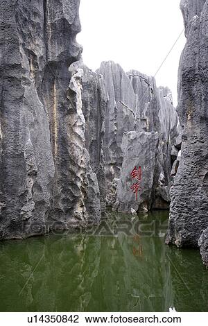 Stock Image - China, Yunnan, Shilin (The Stone Forest). Fotosearch