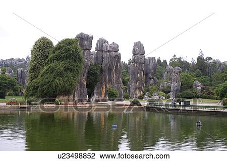 Stock Image - China, Yunnan, Shilin (The Stone Forest). Fotosearch