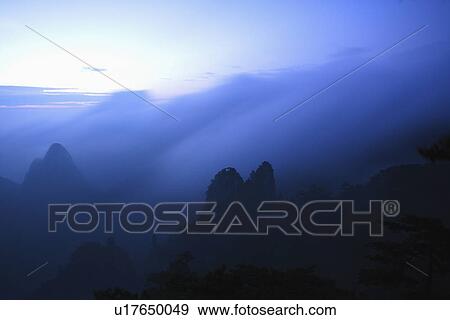 Stock Photo - China, Anhui, Mt. Huangshan, The Lion Peak at Sunrise. Fotosearch