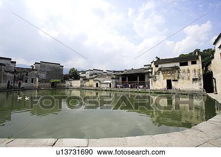 Stock Image - Half-moon pond, Hongcun village, Anhui Province, China, Asia. Fotosearch
