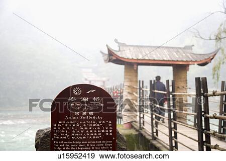 Stock Photo - China, Sichuan, Dujiang Dam, Ancient suspension bridge. Fotosearch