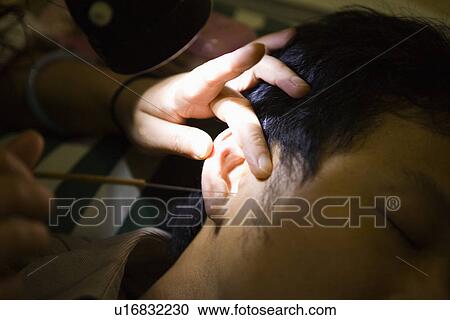 Stock Image - Ears care. Fotosearch