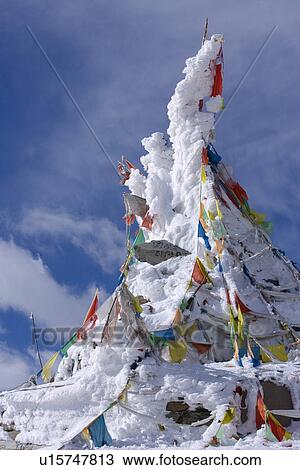 China, Sichuan Province, Chuanzhusi Town, Xuebao Peak, Prayer flags covered by snow View Large Photo Image Stock Image - China, Sichuan Province, Chuanzhusi Town, Xuebao Peak, Prayer flags covered by snow. Fotosearch