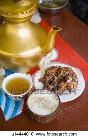 Stock Image - China, Sichuan Province, Highland Barley Wine and Butter Tea. Fotosearch