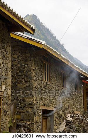 Stock Image - China, Sichuan Province, Jiuzhaigou, House. Fotosearch