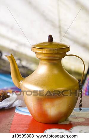 Stock Image - China, Sichuan Province, Pot with Highland Barley Wine. Fotosearch