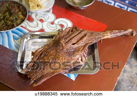 China, Sichuan Province, Roast lamb leg on tray View Large Photo Image Stock Photography - China, Sichuan Province, Roast lamb leg on tray. Fotosearch