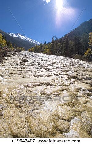 Stock Photo - China, Sichuan, Huanglong, Golden Sand Of Earth. Fotosearch