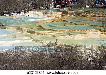 Stock Image - Naturally formed limestone pools in terraced formation, Multi-colored Pool, Huanglong, Sichuan, China. Fotosearch