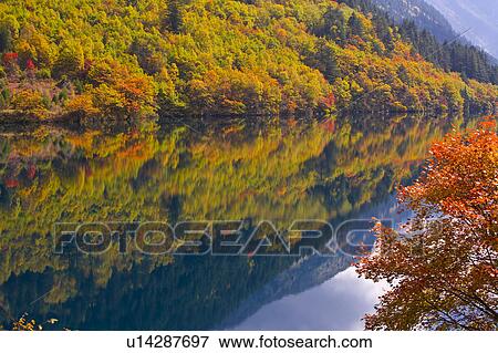 China, Sichuan Province, Nine Village Valley, pond with autumn foliage View Large Photo Image Stock Photo - China, Sichuan Province, Nine Village Valley, pond with autumn foliage. Fotosearch