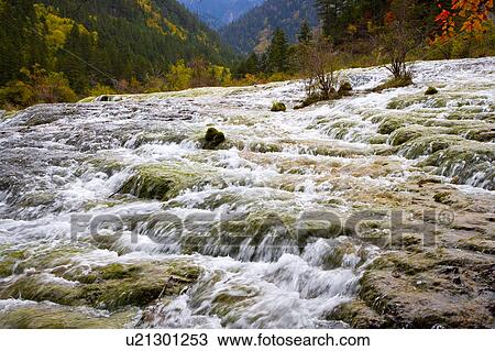 Stock Image - China, Sichuan Province, Nine Village Valley, Pearl Shoal. Fotosearch