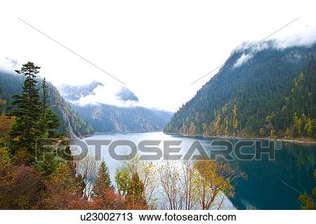 Stock Image - China, Sichuan Province, Nine Village Valley, Long Lake. Fotosearch
