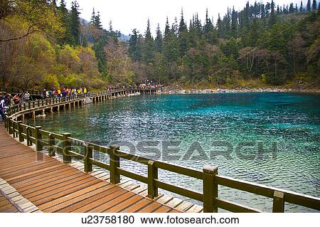 Stock Image - China, Sichuan Province, Nine Village Valley, Colorful Pool. Fotosearch