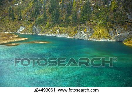 Stock Image - China, Sichuan Province, Nine Village Valley, Season Lake. Fotosearch