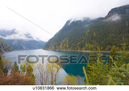 Stock Photograph - China, South Central China, Sichuan Province, Jiuzhaigou, Long Lake. Fotosearch
