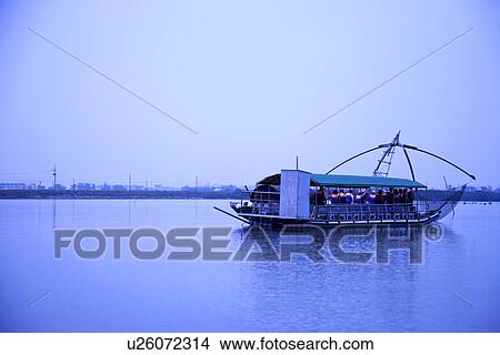 Taiwan, Cigu Lagoon with fishing boat View Large Photo Image Picture - Taiwan, Cigu Lagoon with fishing boat. Fotosearch