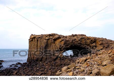 Taiwan, Penghu, Sea-Eroded Rock with hole View Large Photo Image Stock Photograph - Taiwan, Penghu, Sea-Eroded Rock with hole. Fotosearch