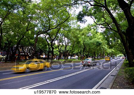 Stock Image - Asia, Taiwan, Taipei, City road. Fotosearch