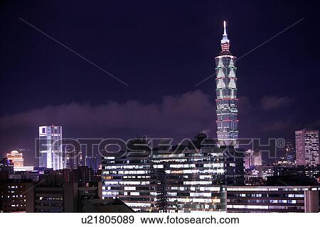 Stock Photo - Taipei cityscape at night in distance. Fotosearch