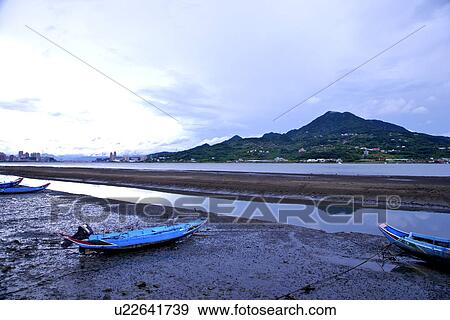 Stock Photo - Asia, Taiwan, Boats moored at riverside. Fotosearch