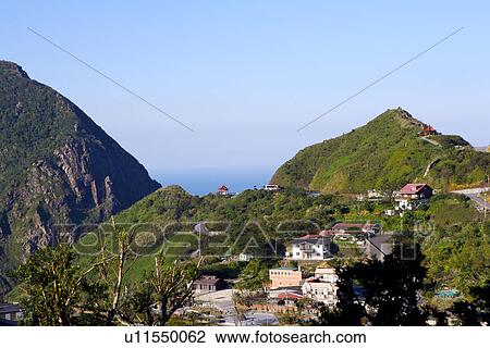 Stock Image - Asia, Taiwan, Jiufen, Houses and mountain. Fotosearch
