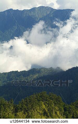 Mountains with clouds View Large Photo Image Picture - Mountains with clouds. Fotosearch