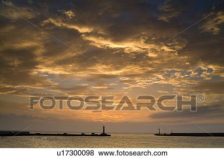 Stock Photo - Taiwan, Sea under pink cloud. Fotosearch