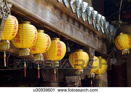 Chinese lanterns hanging on eaves, Tian Ho Kung, Taiwan, Asia View Large Photo Image Stock Image - Chinese lanterns hanging on eaves, Tian Ho Kung, Taiwan, Asia. Fotosearch