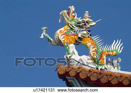 Stock Image - Roof with ornate dragon, Tian Ho Kung, Taiwan, Asia. Fotosearch
