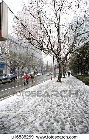 Stock Photo - China, Shanghai, city scene with snow. Fotosearch