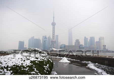 Stock Photography - China, Shanghai, skyline with Oriental Pearl Tower, snow. Fotosearch