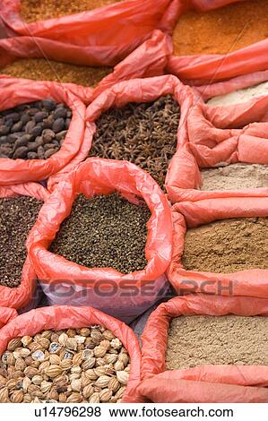 Stock Photo - Dry food in bags at market. Fotosearch