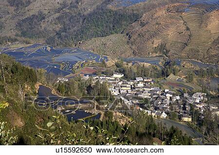Stock Image - China, Yunnan Province, Yuanyang, Duoyishu, Village. Fotosearch