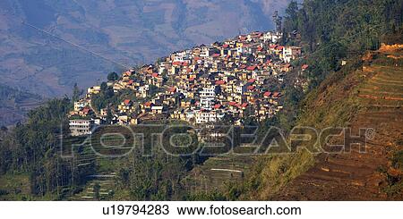 China, Yunnan Province, Yuanyang, Houses on hillside View Large Photo Image Stock Image - China, Yunnan Province, Yuanyang, Houses on hillside. Fotosearch