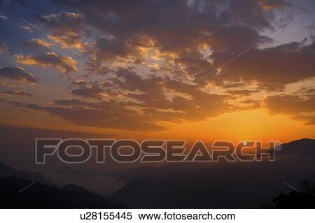 Stock Photography - China, Yunnan Province, Yuanyang, Sunrise. Fotosearch