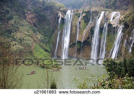 Stock Image - China, Yunnan Province, Luoping County, Nine-dragon Waterfall. Fotosearch