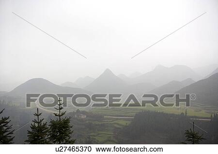 China, Yunnan Province, Luoping County, Mountain Range View Large Photo Image Stock Image - China, Yunnan Province, Luoping County, Mountain Range. Fotosearch