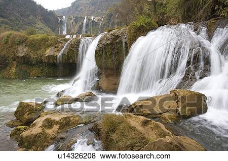 Stock Photo - China, Yunnan Province, Luoping County, Nine-dragon Waterfall. Fotosearch