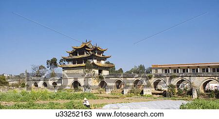 Stock Image - China, Yunnan Province, Jianshui, Double-dragon Bridge. Fotosearch