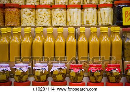 Close-up of preserved food in a row View Large Photo Image Picture - Close-up of preserved food in a row. Fotosearch